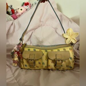 Dooney and Burke oil cloth cream candy monogram bag